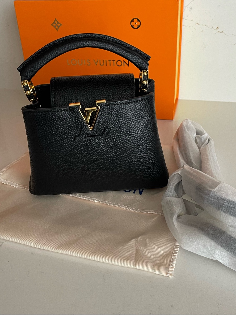 Black Capucines mini bag